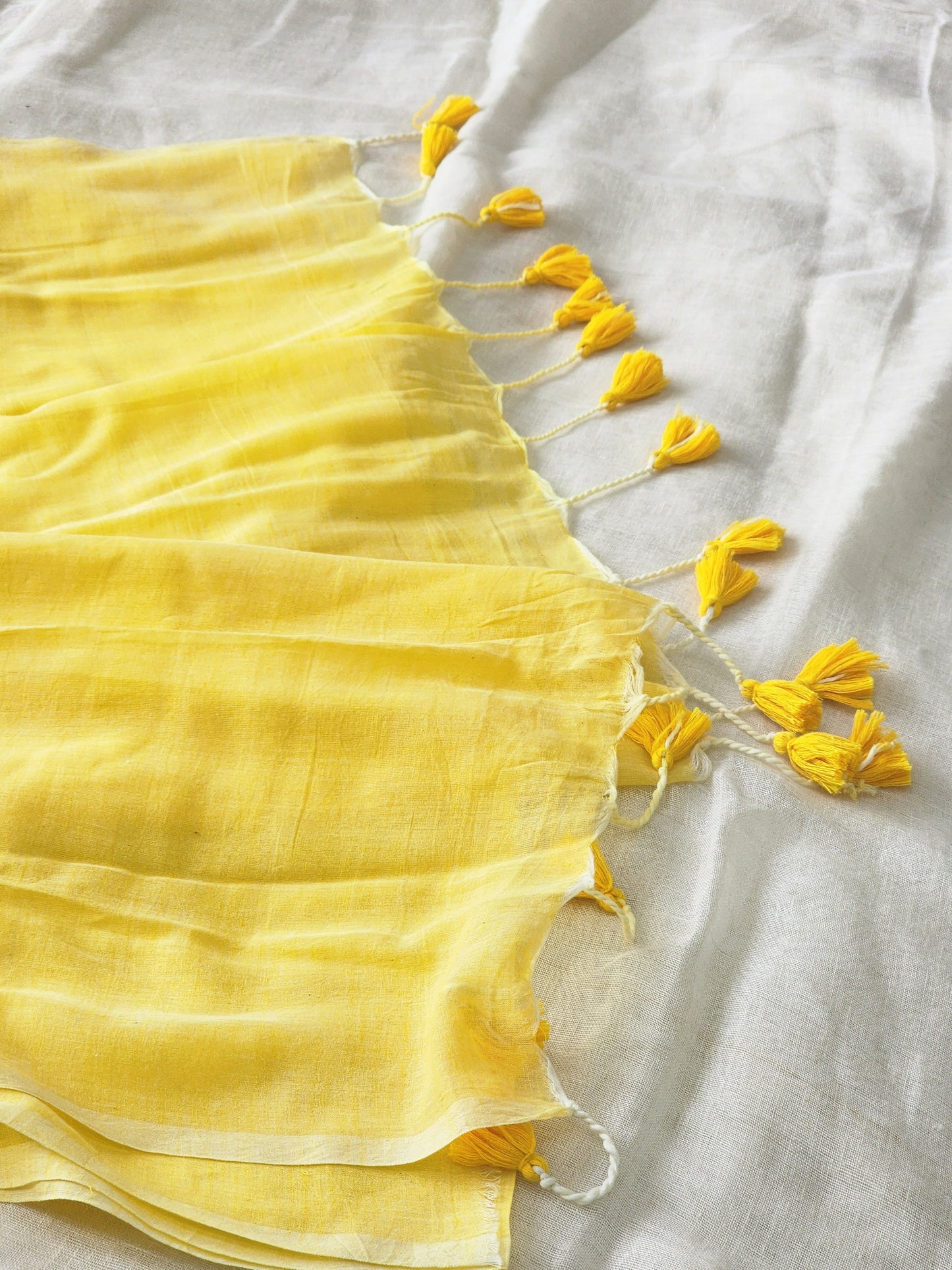 Pastel yellow mulmul cotton saree