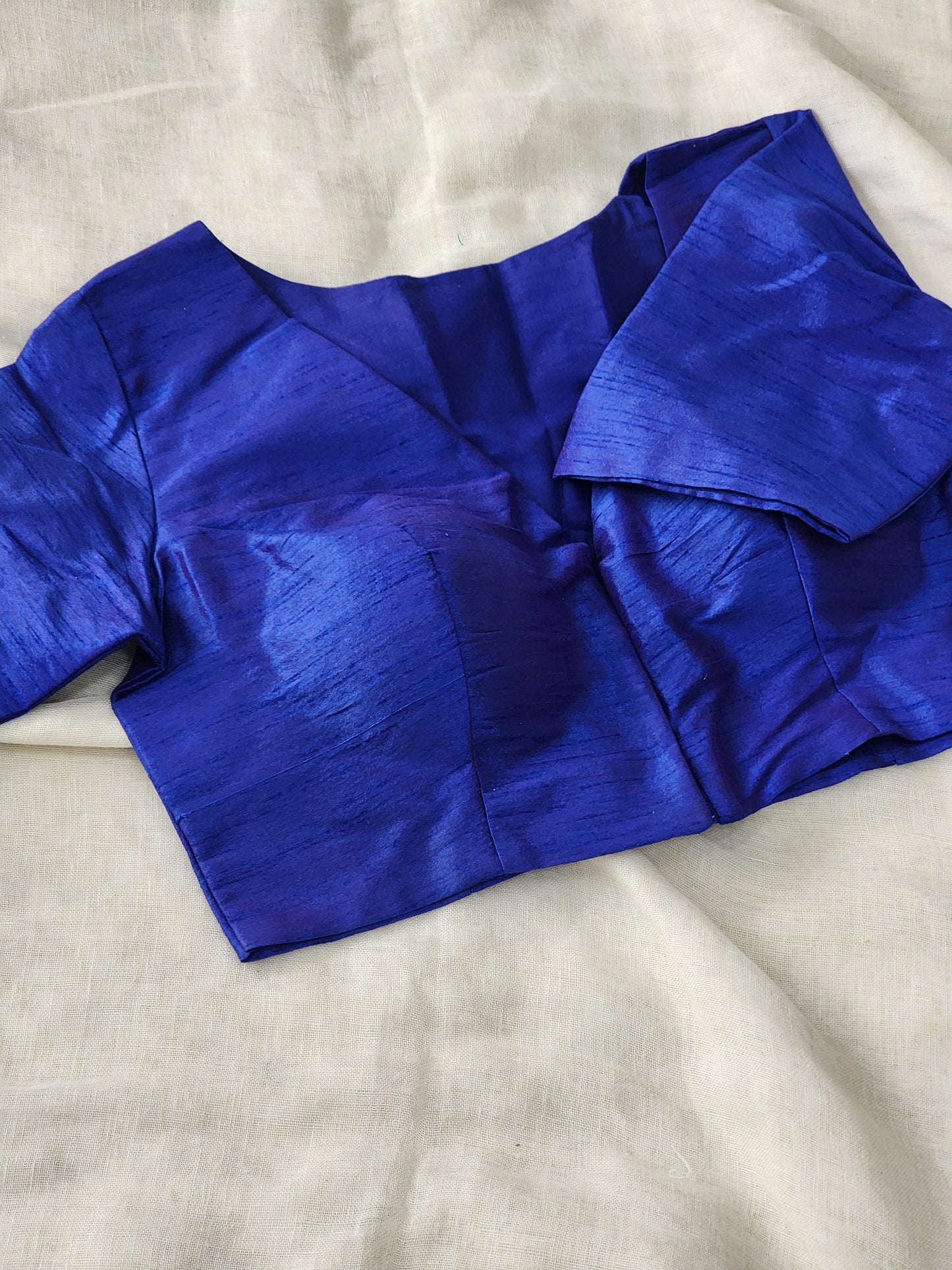Blue raw silk blouse